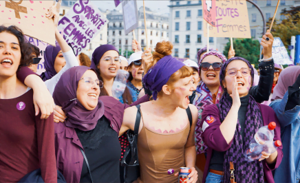 Members of 'Les Foulards Violets' (The Purple Scarves), a collective of Muslim and and non-Muslim women who stand in solidarity with those who wear the headscarf, at a protest in Geneva, Switzerland.