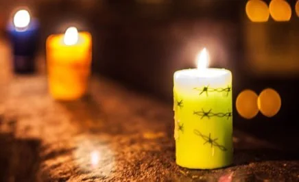 Amnesty International Candle on ledge